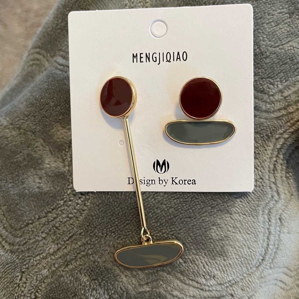 asymmetrical earrings